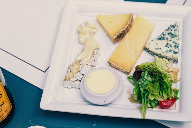 A Morning in Paris Food Tour: Croissants, Baguettes & Chocolate - Cheese, butter, and bread at Terroirs d’Avenir