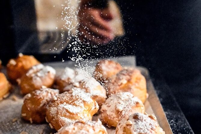 Authentic Parisian Gourmet Food Tour with 10 Local Dishes & Wines - Notre Dame: pastries, islands, and the Latin Quarter