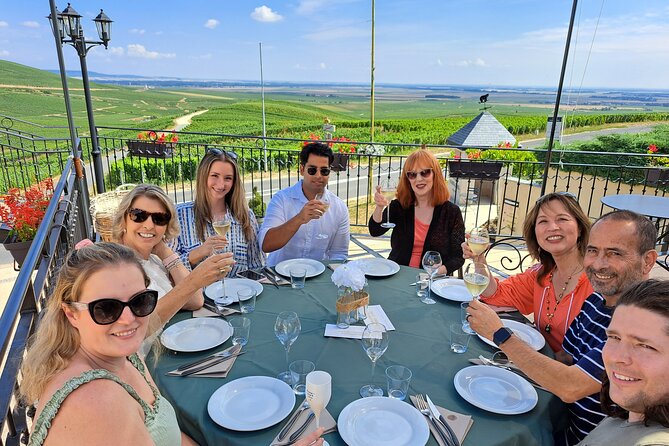 Champagne Day Trip from Paris with 8 Tastings & Lunch - A short stop for Reims, views, or vineyard photos