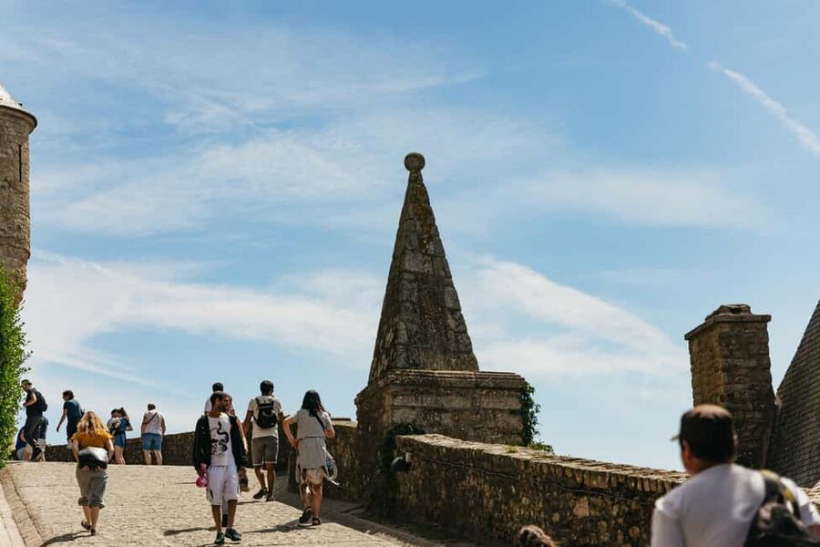 Day Trip to Mont-Saint-Michel from Paris - Climbing through the village and up to the abbey