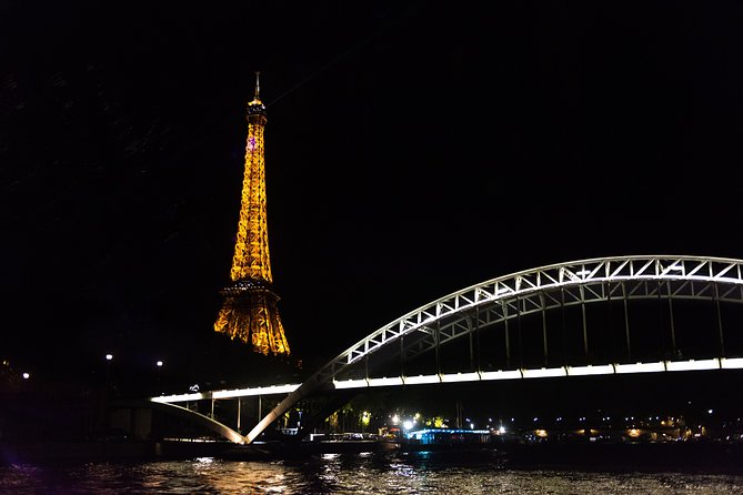 Eiffel Tower and City Tour by Bus with Seine River Cruise Option - The Seine cruise beneath Paris’s bridges