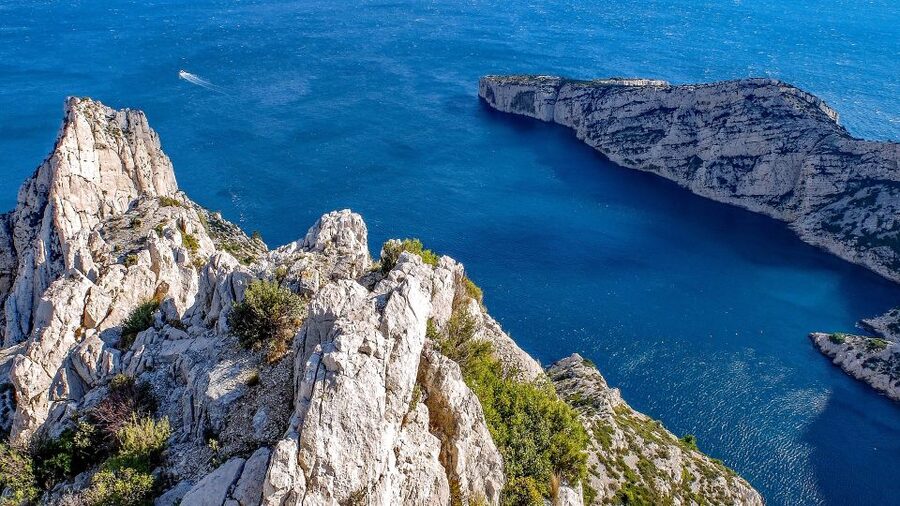 From Marseille: Calanques National Park Guided Hike - Walking through pine, rosemary, and open rock