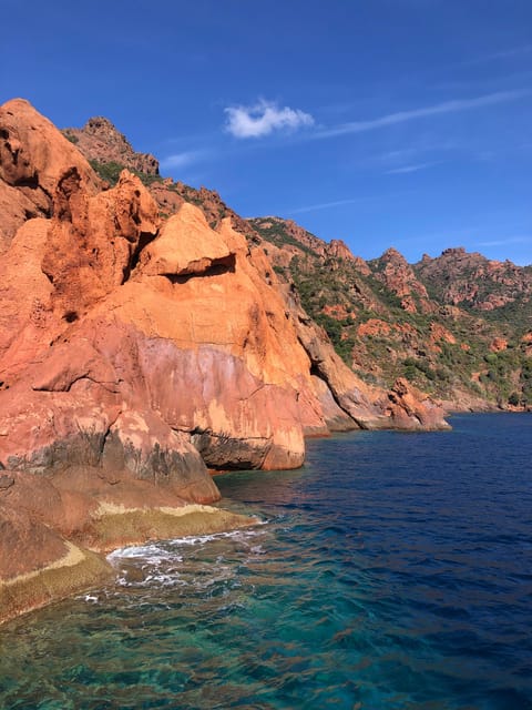 From Sagone/Cargèse: Scandola and Calanques de Piana Cruise - Capo Rosso, caves, and the swim stop