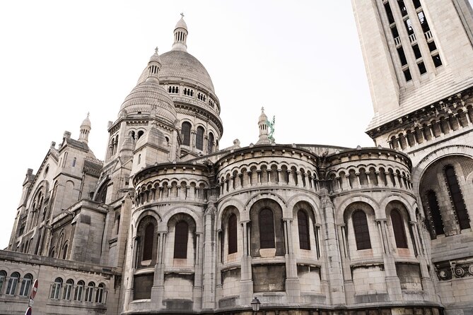 Hidden Montmartre: Paris' Secret Streets Walking Tour - Montmartre’s vineyard and Au Lapin Agile