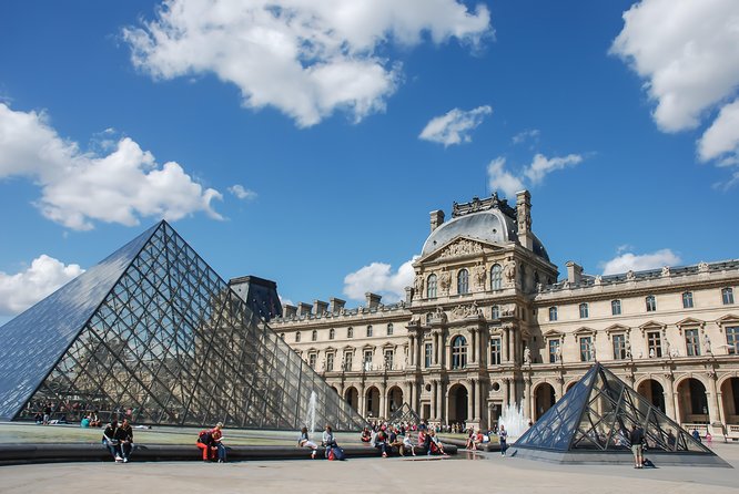 Louvre Priority Access with Mona Lisa Escort or Guided Option - Entering the Louvre through its grand approach