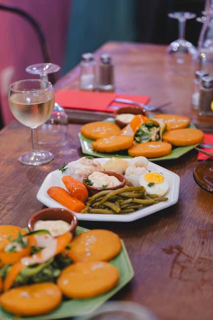 Marseille: Walking Food Tour with Full Meal - Rue Caisserie and the meal between landmarks