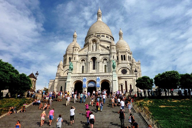 Montmartre Hidden Gems and Scenic Highlights Walking Tour - Moulin de la Galette and the old dance-hall spirit