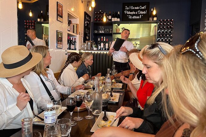 Montmartre Hill French Gourmet Food and Wine Tasting Walking Tour - Wine, cheese, and time to catch your breath