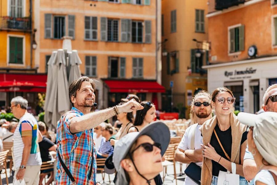 Nice: Old Town & Castle Hill Informative Guided Walking Tour - Read Place Massena through its red facades