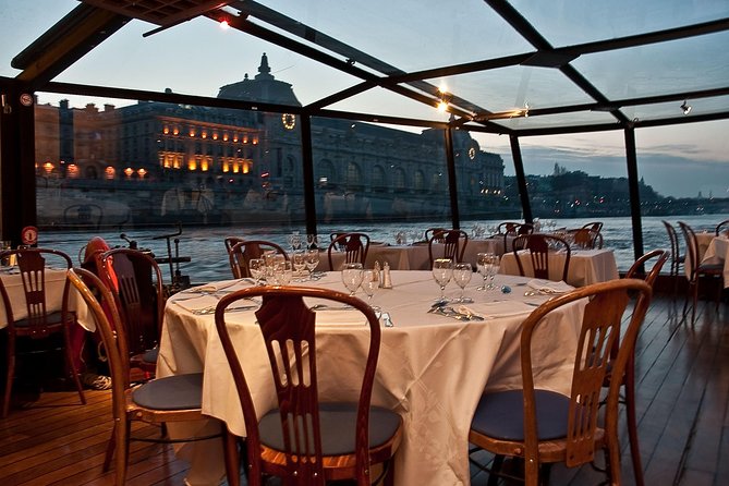 Paris 3-Courses Gourmet Dinner Seine River Cruise with Champagne - Champagne, music, and the final bill
