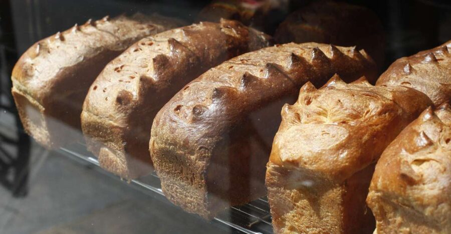 Paris: Behind the Scenes Bakery Tour with Breakfast - Entering a working Paris boulangerie