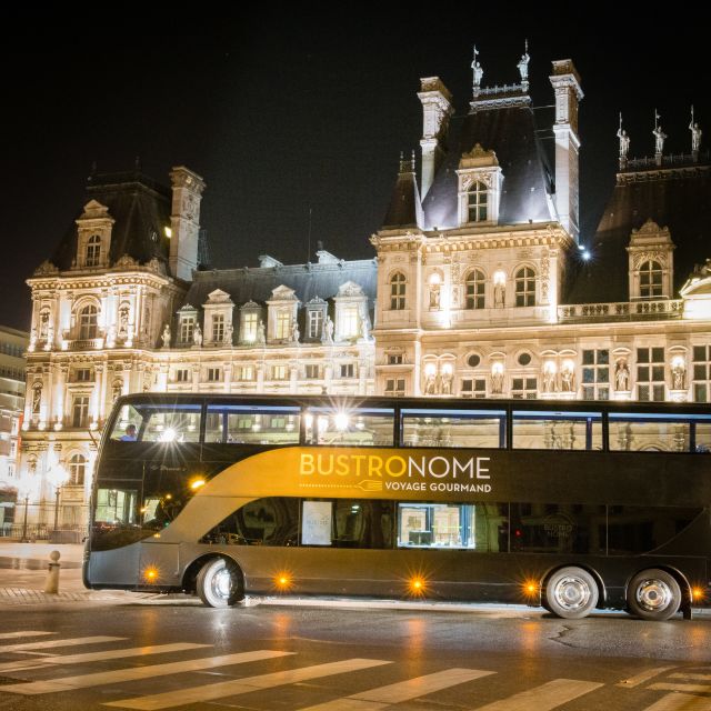 Paris: Bustronome Gourmet Dinner Tour - Paris after dark from the glass terrace