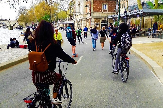 Paris: Charming Nooks and Crannies Bike Tour - A calmer stretch beside the Seine