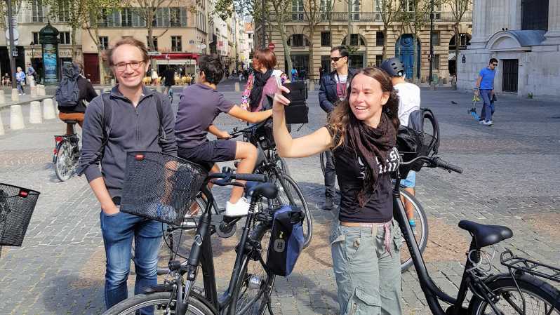 Paris: City Treasures Bike Tour - The Louvre, the love-lock bridge, and central views