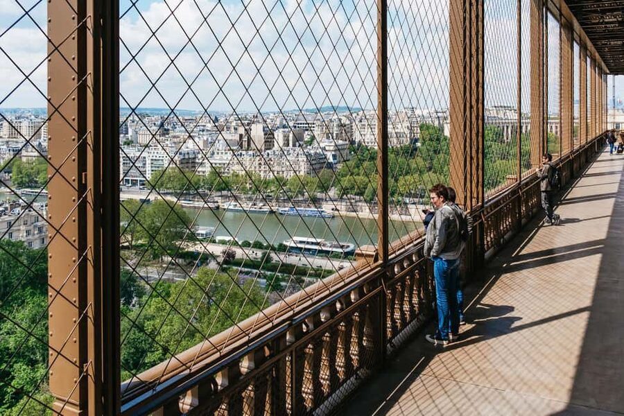 Paris: Eiffel Tower Fully Guided Tour with Summit Option - The opening story of the Iron Lady