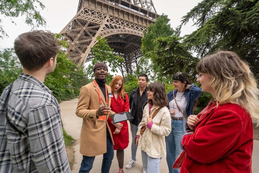 Paris: Eiffel Tower Guided Tour with Summit Access - Stories about a tower Paris nearly lost