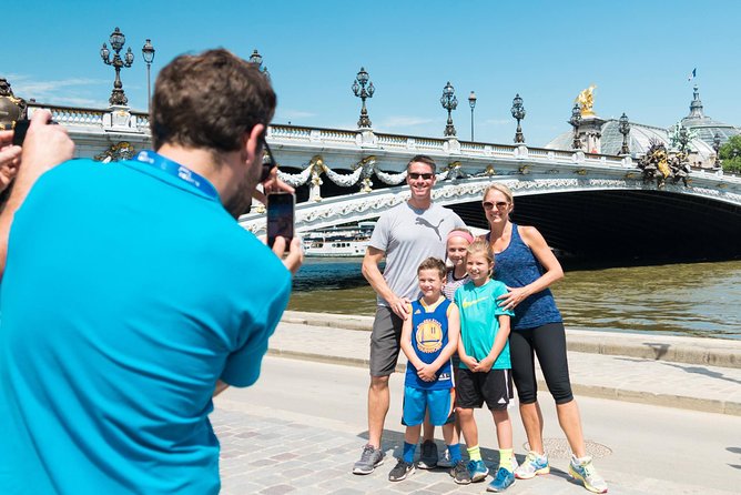 Paris Highlights Bike Tour: Eiffel Tower, Louvre and Notre-Dame - Grand Palais and the Champs-Elysées