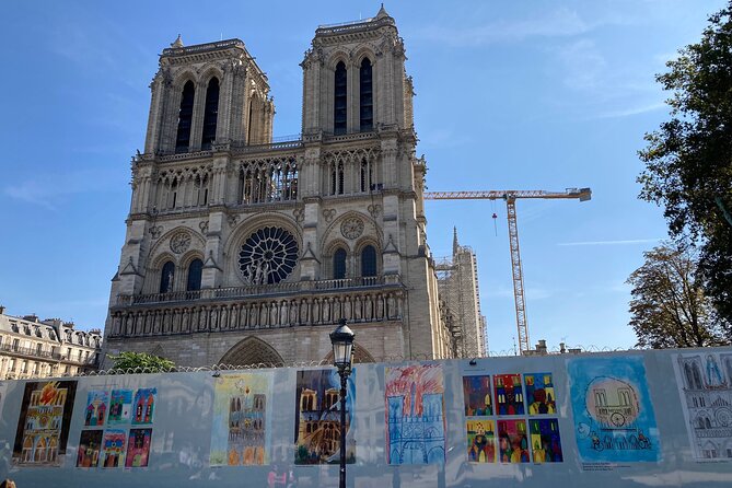 Paris: Île de la Cité and Notre-Dame Walking Tour With Crypt - Place Dauphine and the royal quarter