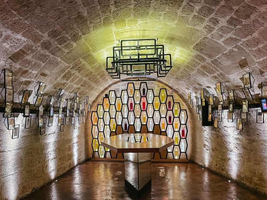 Paris: Les Caves du Louvre Guided Tour with Wine Tastings - Using all five senses instead of just listening