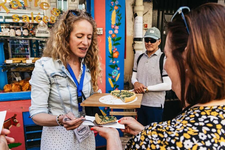 Paris: Montmartre Cheese, Wine & Pastry Guided Walking Tour - Place du Tertre, artists, and the Montmartre myth