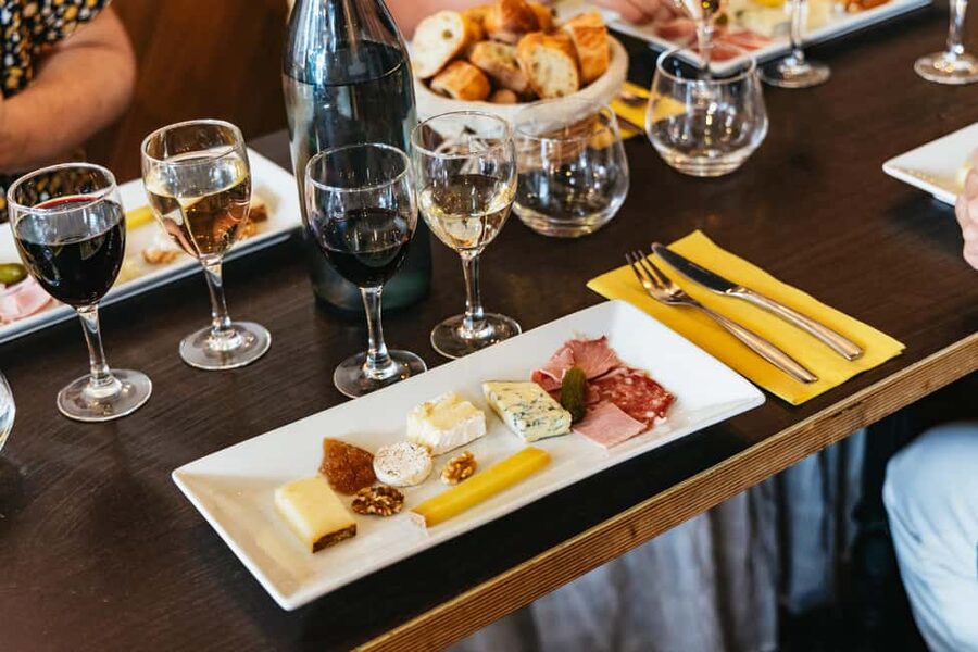 Paris: Montmartre Cheese, Wine & Pastry Guided Walking Tour - Starting at Blanche and following the neighborhood uphill
