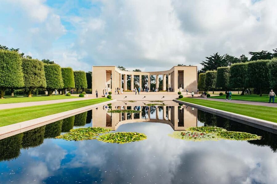 Paris: Normandy D-Day Sites Guided Day Trip with Lunch - A Norman lunch in Grandcamp-Maisy
