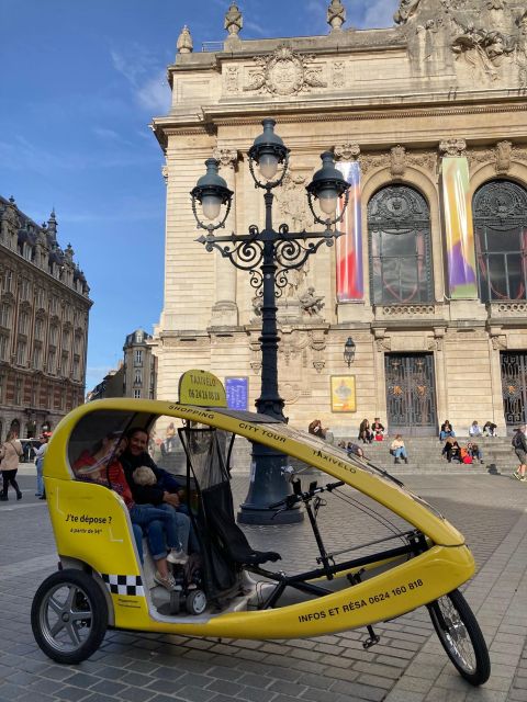 Private guided tour by electric bike taxi - Grand Place and the theater square