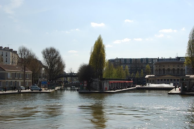 Seine River Cruise and Paris Canals Tour - The guide can make or break the ride