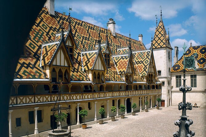 Small-Group Full-Day Tour of Côte de Nuits, Côte de Beaune Vineyards and Beaune Historical District - The first cellar: personal and sometimes hands-on
