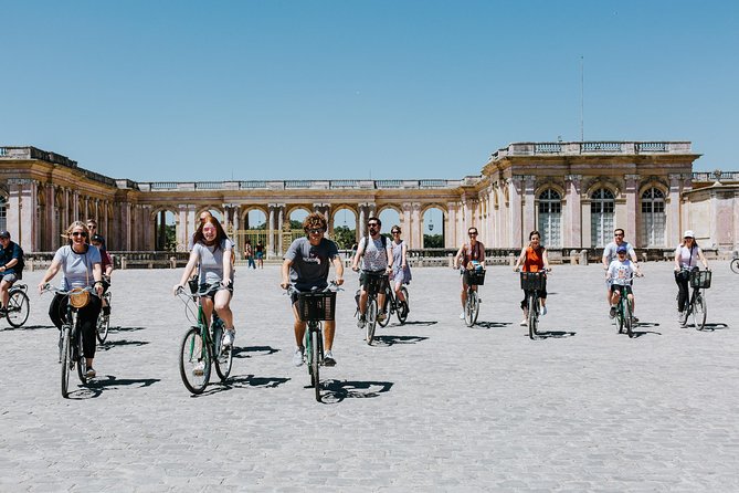 Versailles Domain Bike Tour with Palace Entry by Train from Paris - Cycling through the royal gardens